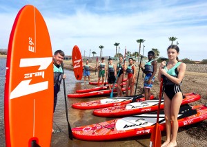 Student group photo paddleboarding copy
